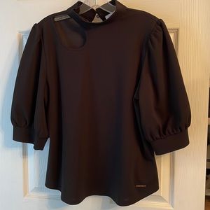 Nine West, L. Asymmetrical collie bone cut out, puff sleeve blouse.